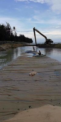 ถุงลดน้ำขนาด 12.6 เมตร สำหรับการกำจัดน้ำในเขื่อนกั้นดินที่บรรจุทรายและการถมทะเล