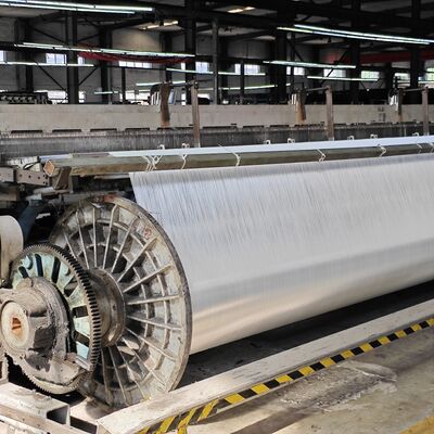 ผ้า Geotextile ทอ PET ที่มีความแข็งแรงสูงพิเศษ 200kN/m สำหรับการปรับปรุงฐานรากที่อ่อนนุ่ม