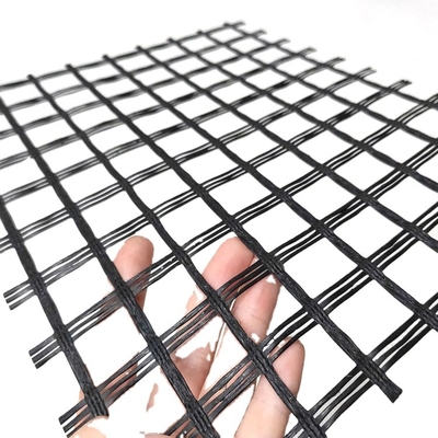 Biaxial ไฟเบอร์กลาส Geogrid เส้นด้าย Bitume ซ่อมถนนเสริมตาข่ายทนด่าง